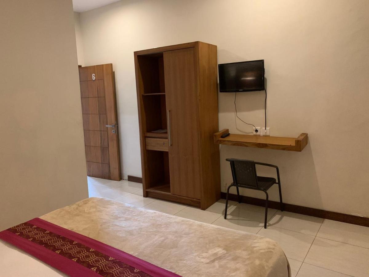 Kuta Suci Guesthouse エクステリア 写真