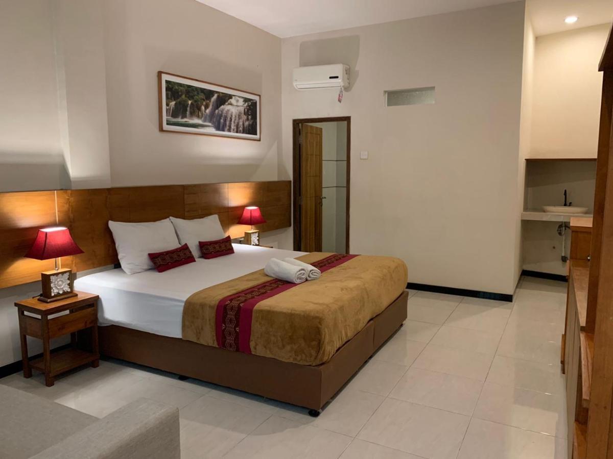Kuta Suci Guesthouse エクステリア 写真