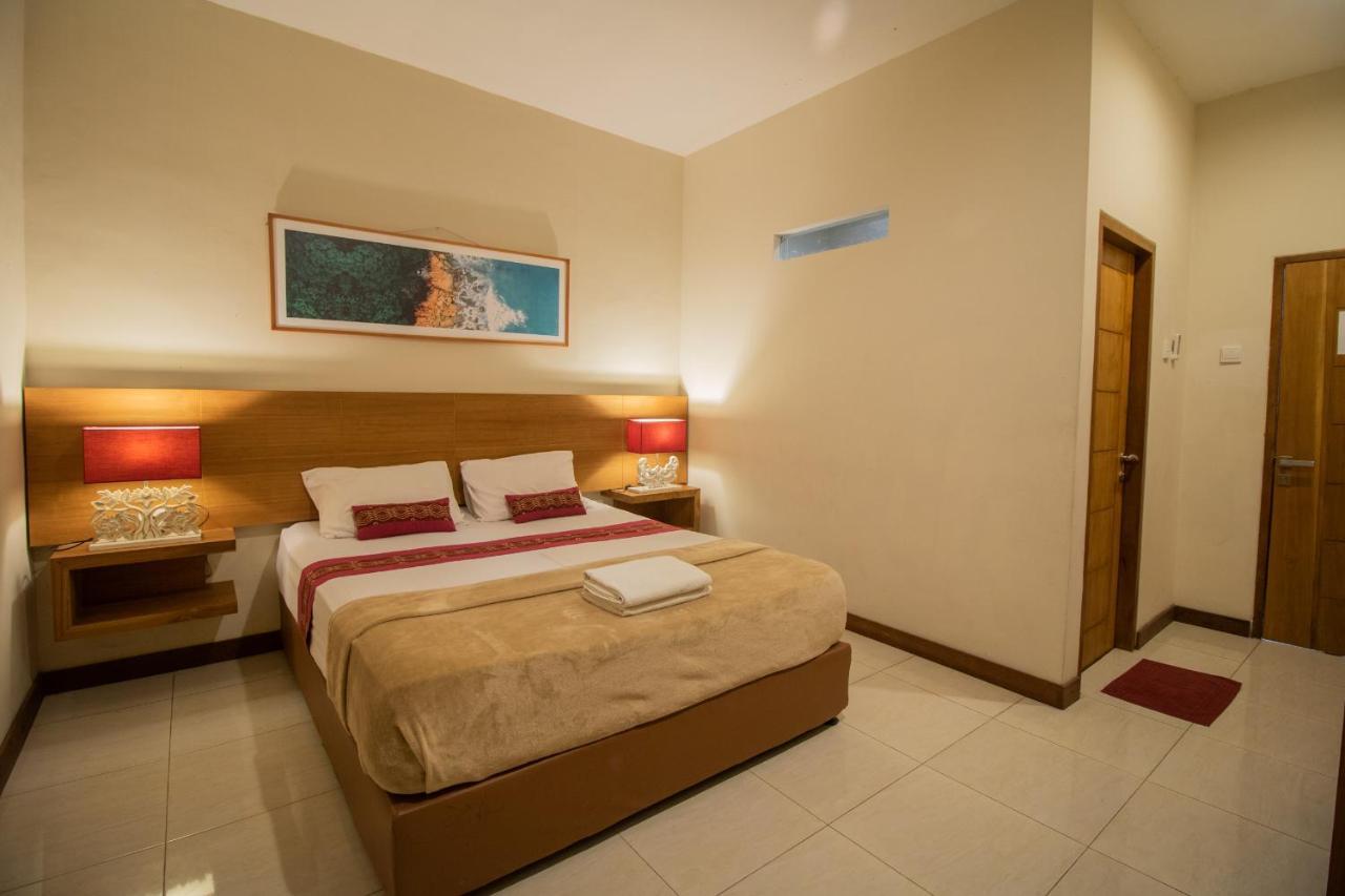 Kuta Suci Guesthouse エクステリア 写真