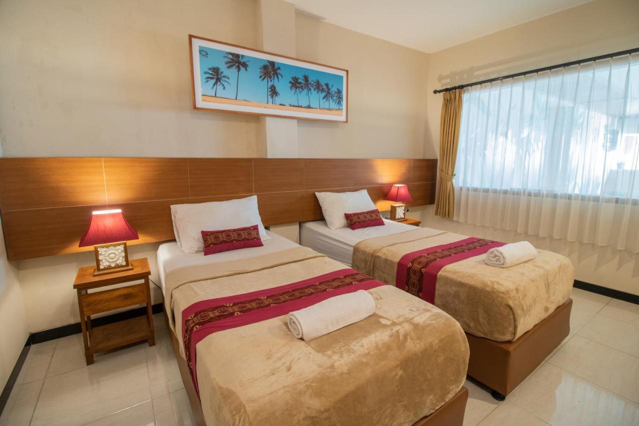 Kuta Suci Guesthouse エクステリア 写真