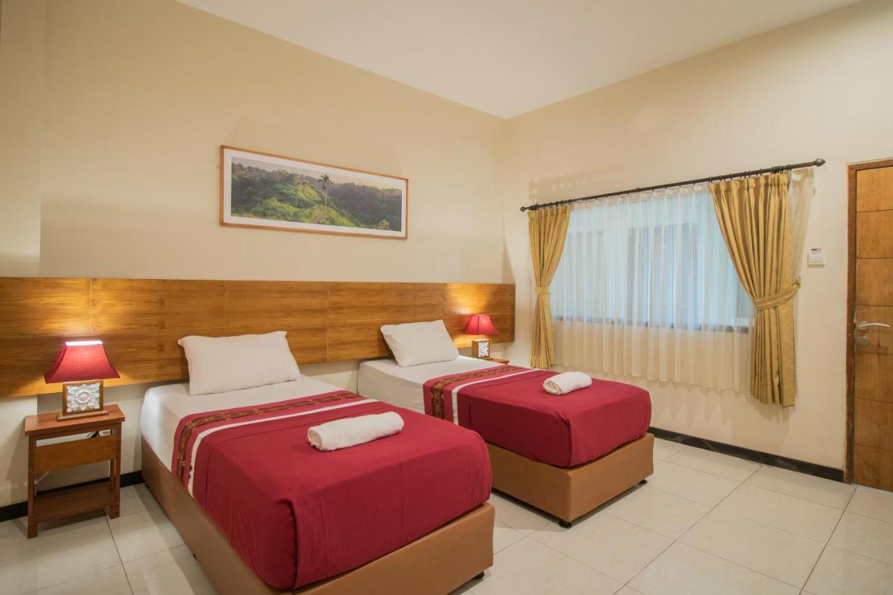 Kuta Suci Guesthouse エクステリア 写真