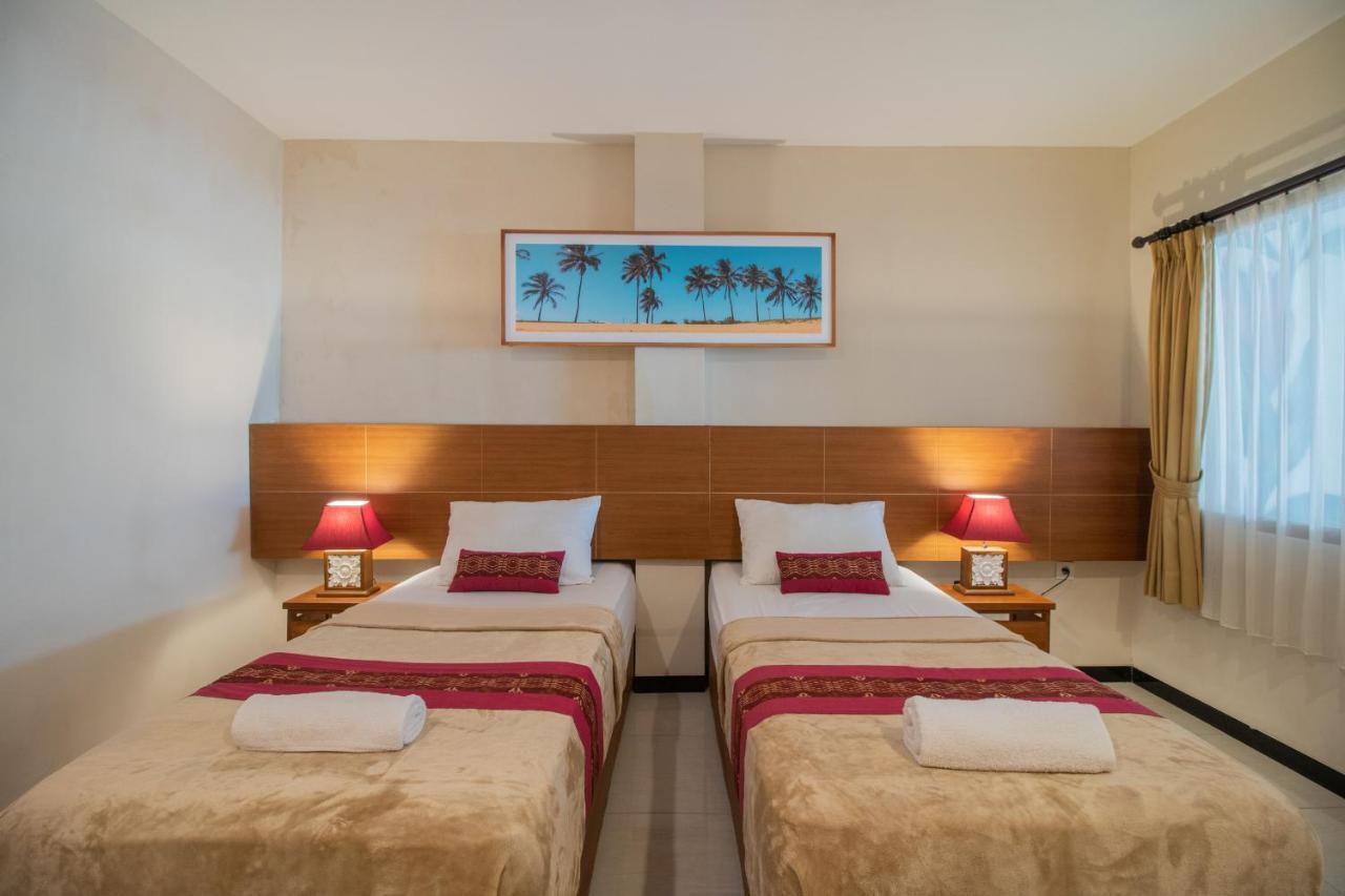 Kuta Suci Guesthouse エクステリア 写真