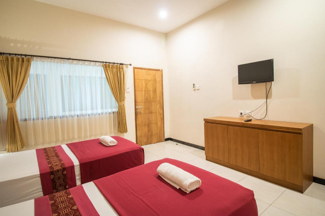 Kuta Suci Guesthouse エクステリア 写真