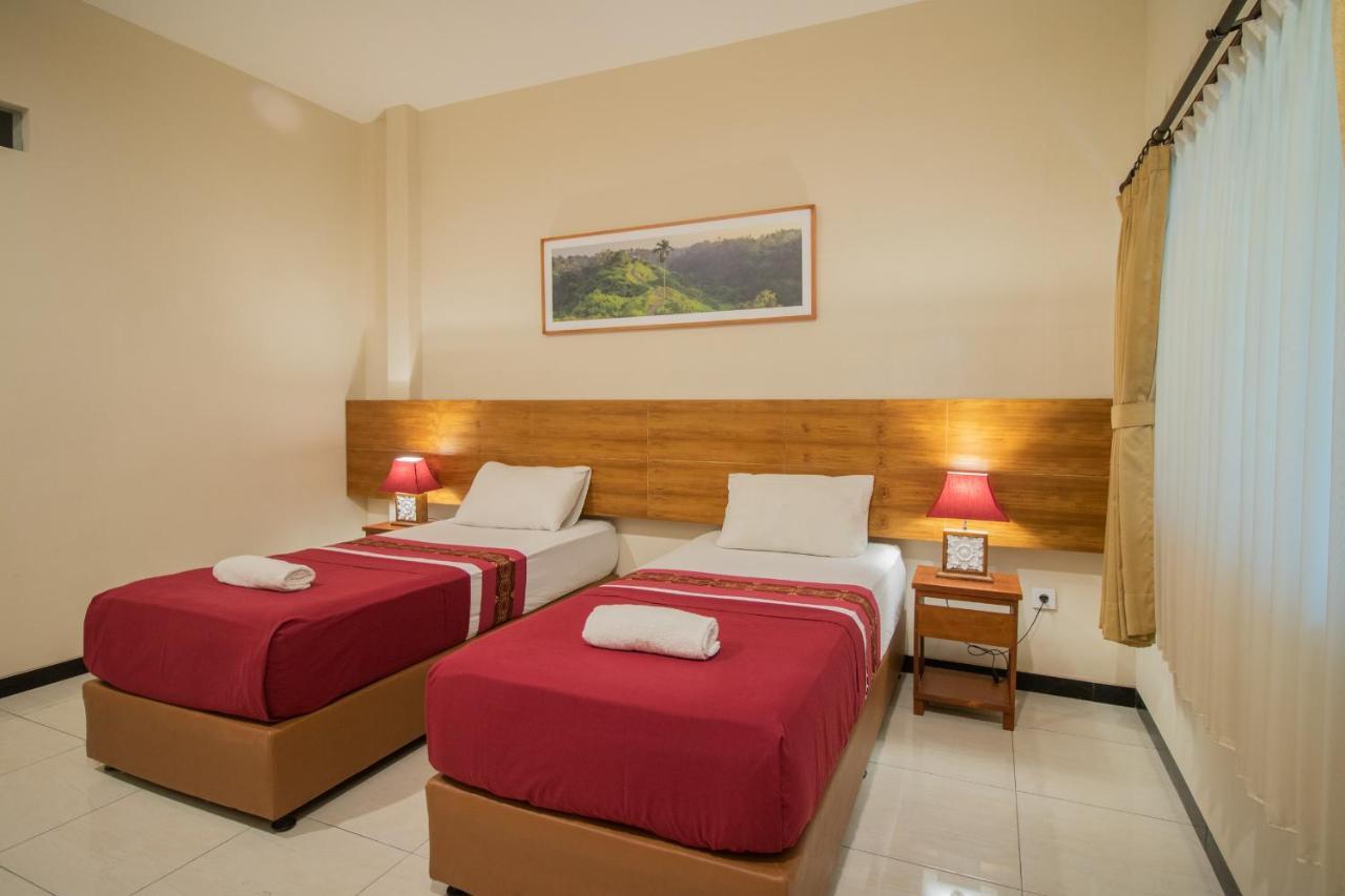 Kuta Suci Guesthouse エクステリア 写真