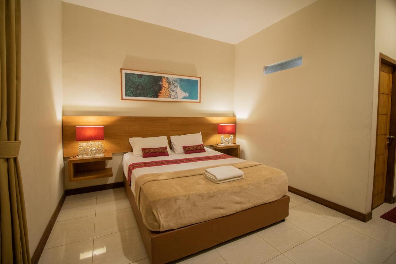 Kuta Suci Guesthouse エクステリア 写真