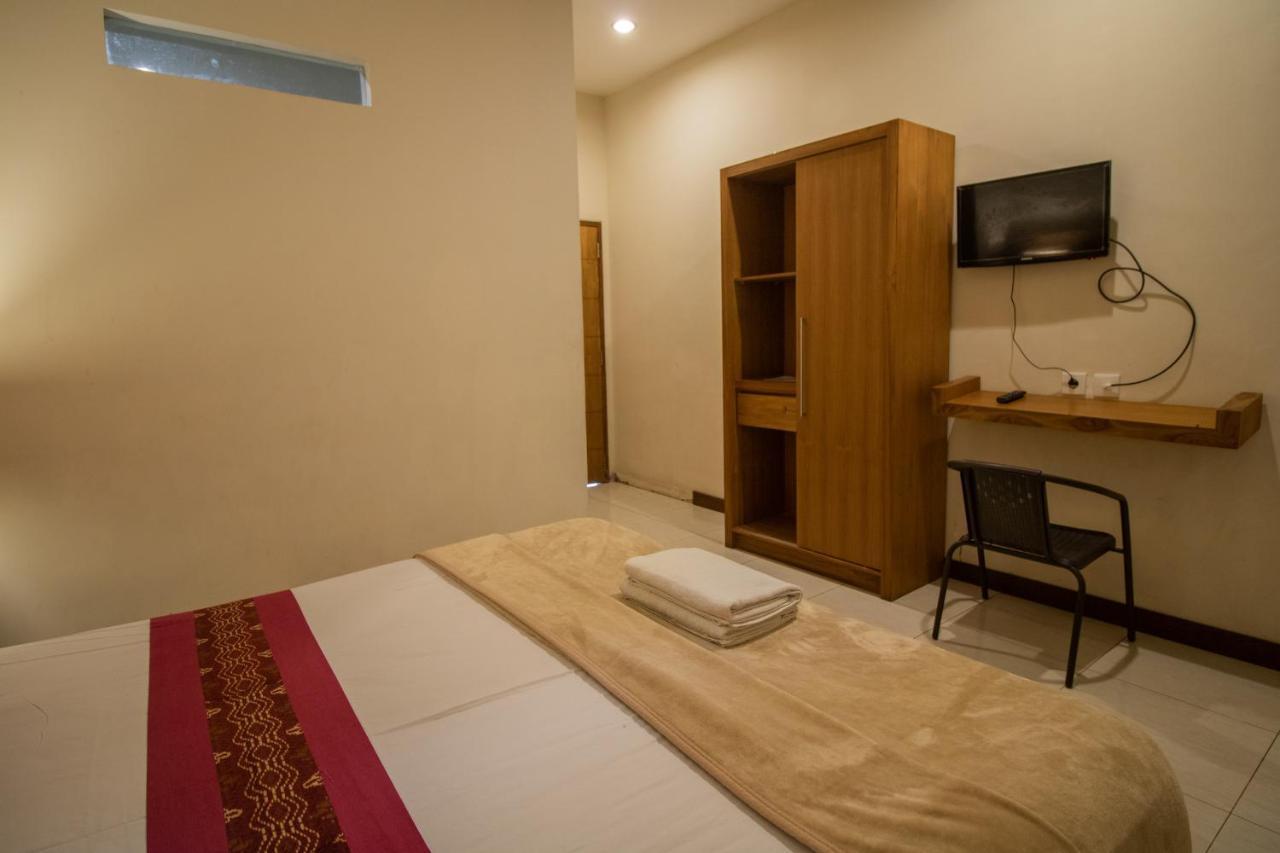 Kuta Suci Guesthouse エクステリア 写真