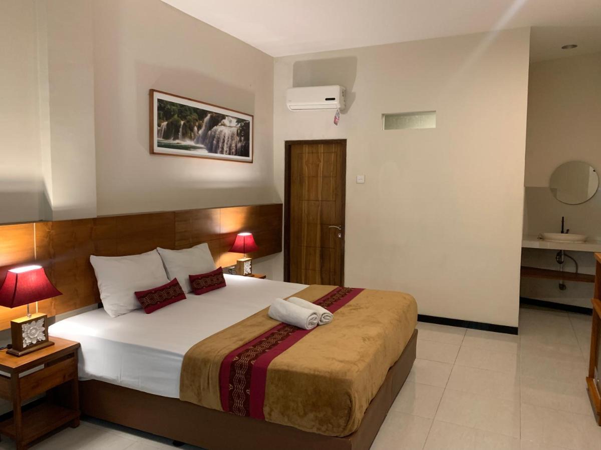 Kuta Suci Guesthouse エクステリア 写真