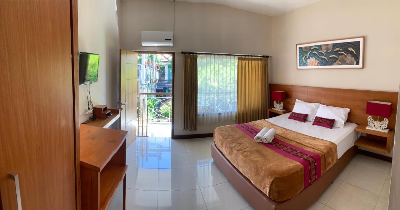 Kuta Suci Guesthouse エクステリア 写真