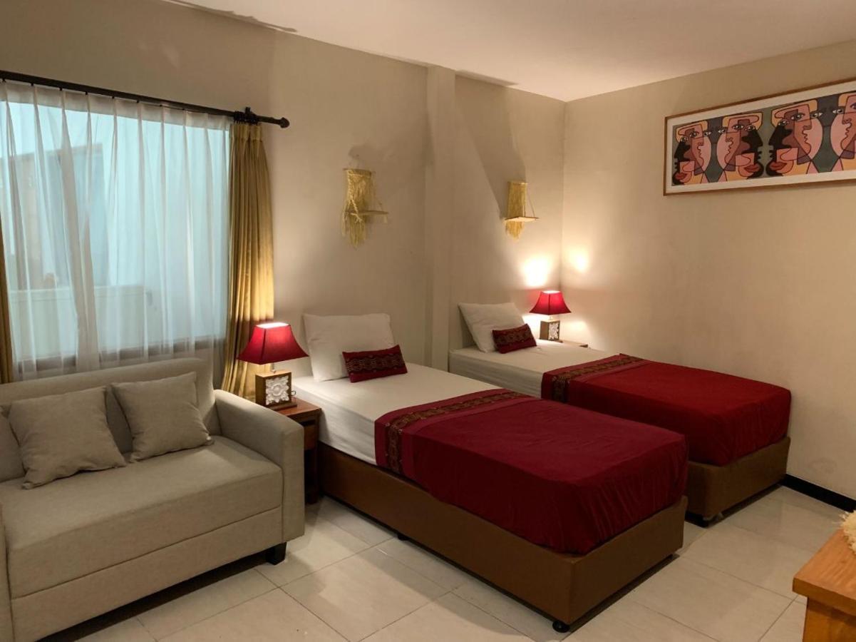 Kuta Suci Guesthouse エクステリア 写真