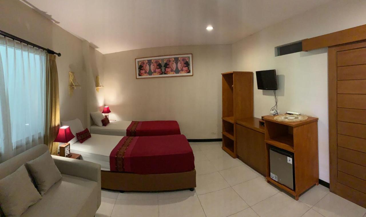 Kuta Suci Guesthouse エクステリア 写真