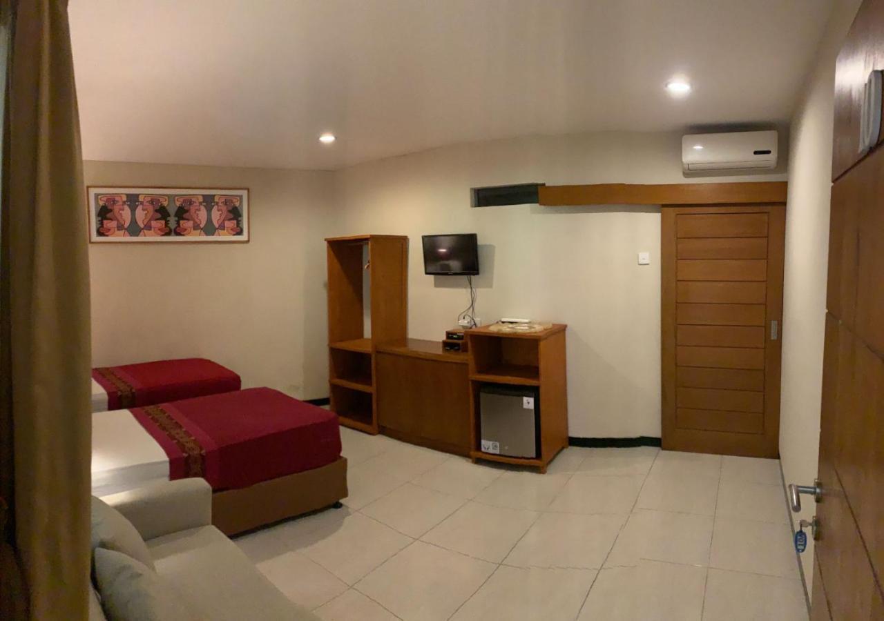 Kuta Suci Guesthouse エクステリア 写真