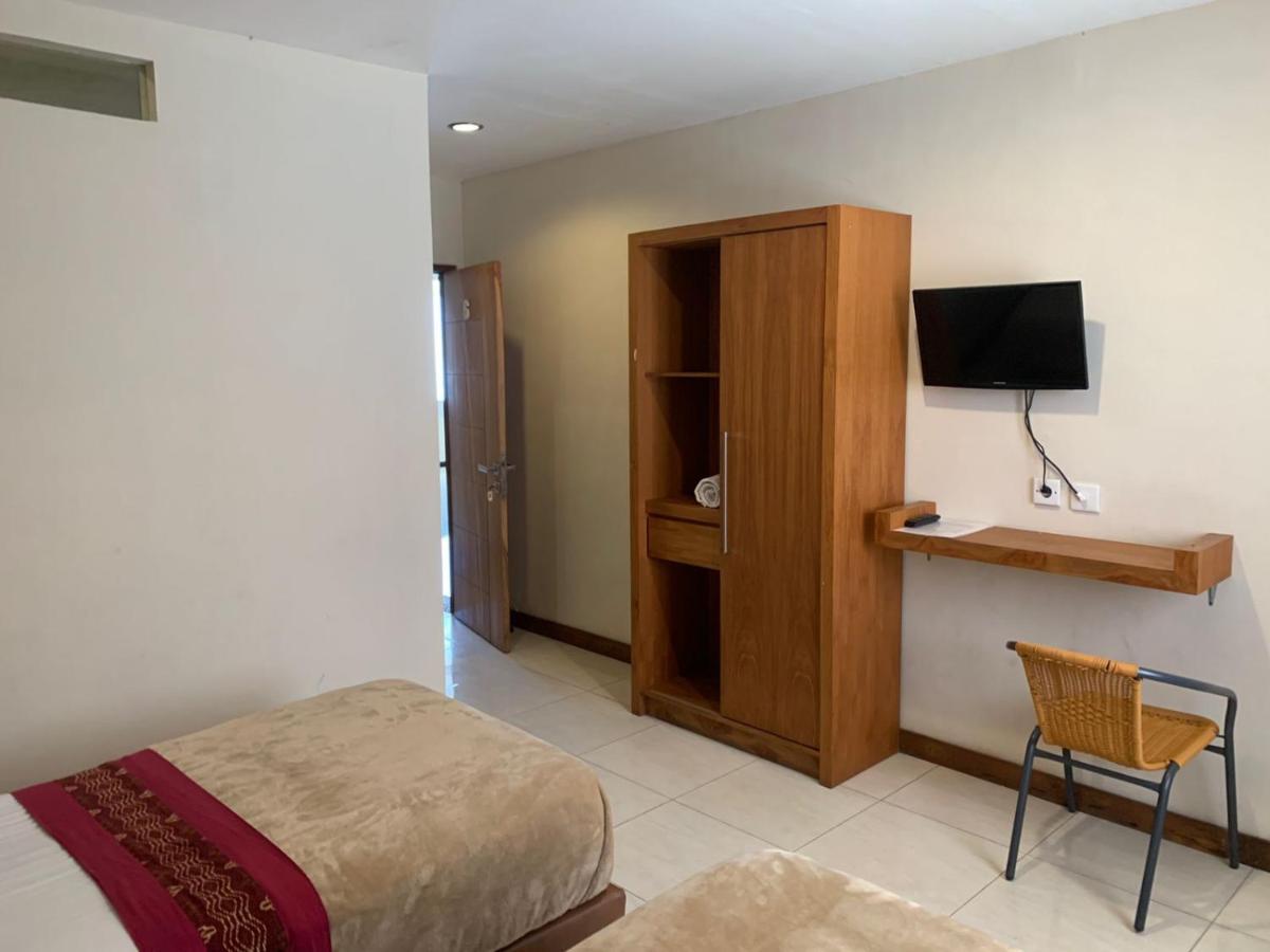 Kuta Suci Guesthouse エクステリア 写真