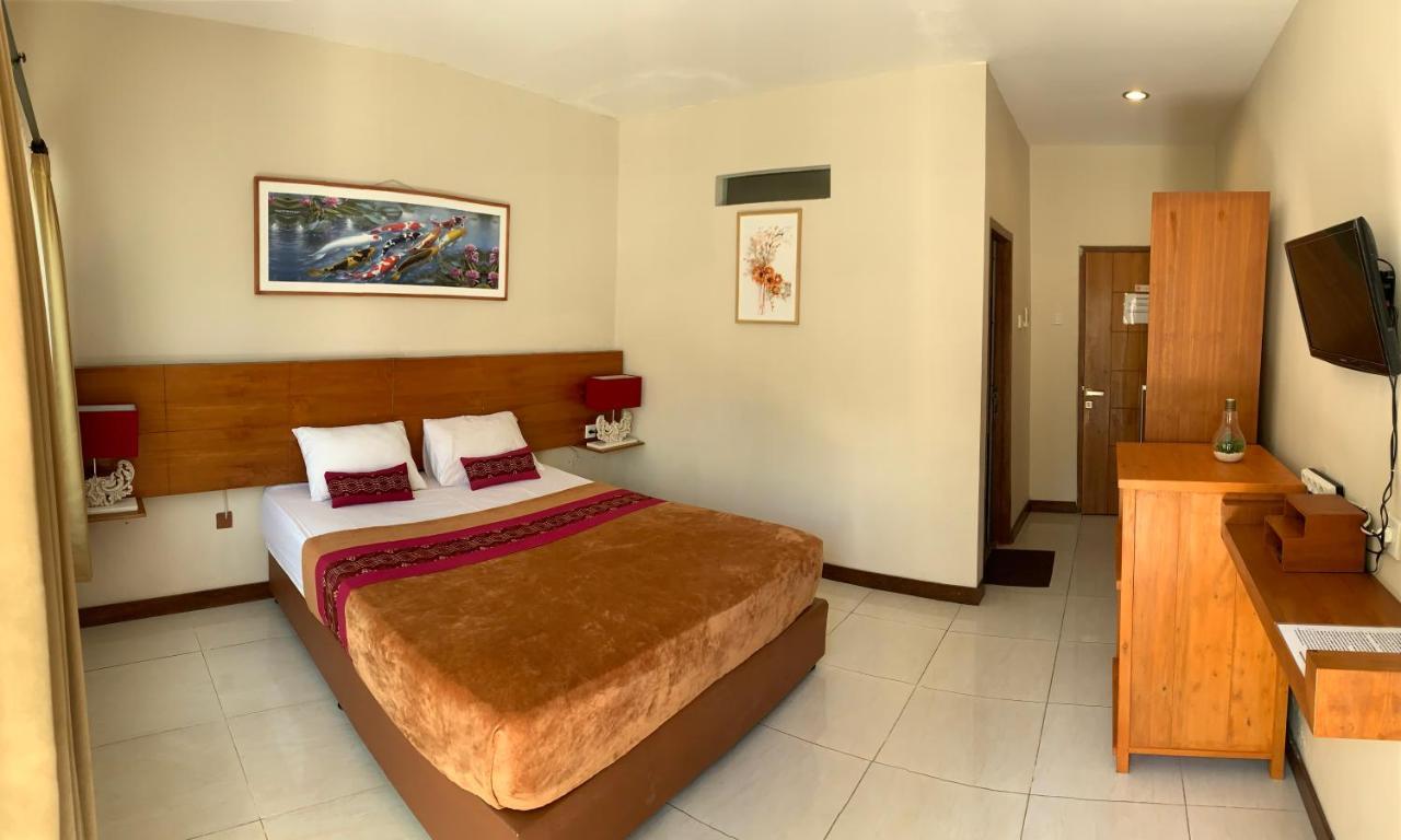 Kuta Suci Guesthouse エクステリア 写真