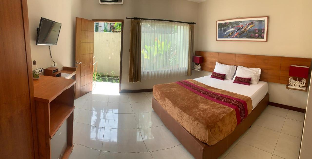 Kuta Suci Guesthouse エクステリア 写真