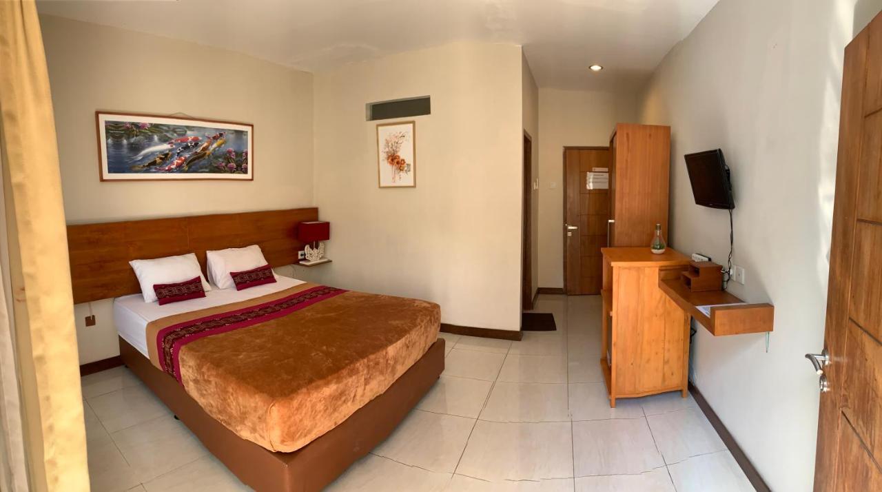 Kuta Suci Guesthouse エクステリア 写真