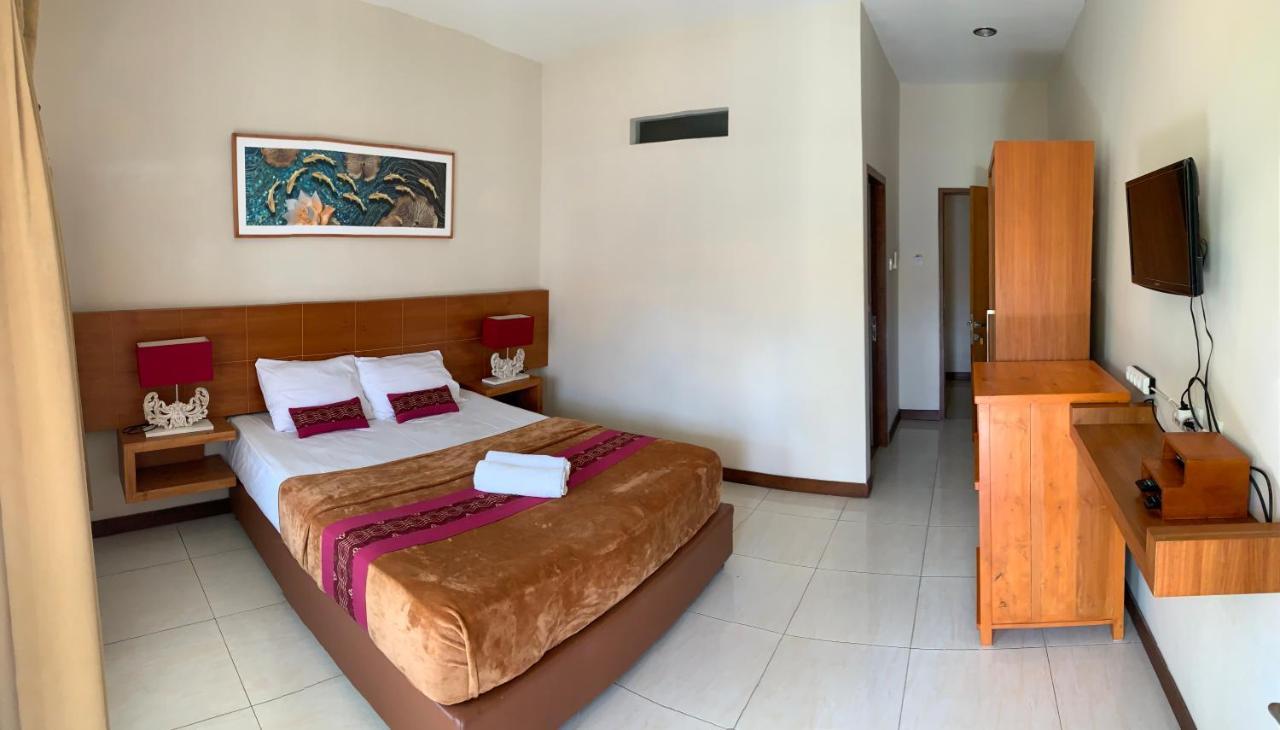 Kuta Suci Guesthouse エクステリア 写真