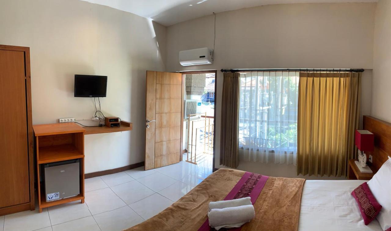 Kuta Suci Guesthouse エクステリア 写真