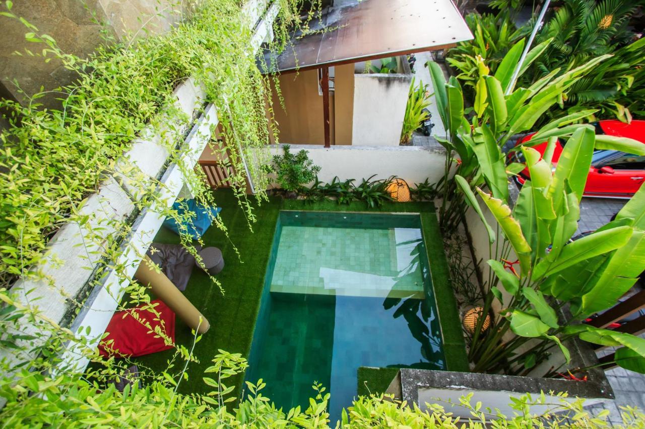 Kuta Suci Guesthouse エクステリア 写真